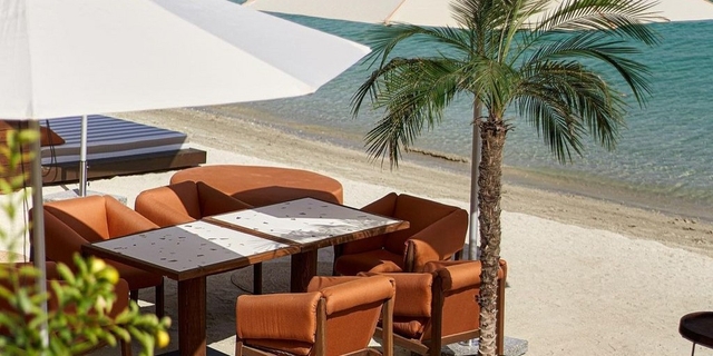 Ría Restaurant & Beach Bar Logo