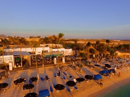 Reflexions Beach Bar & Restaurant Aruba Logo